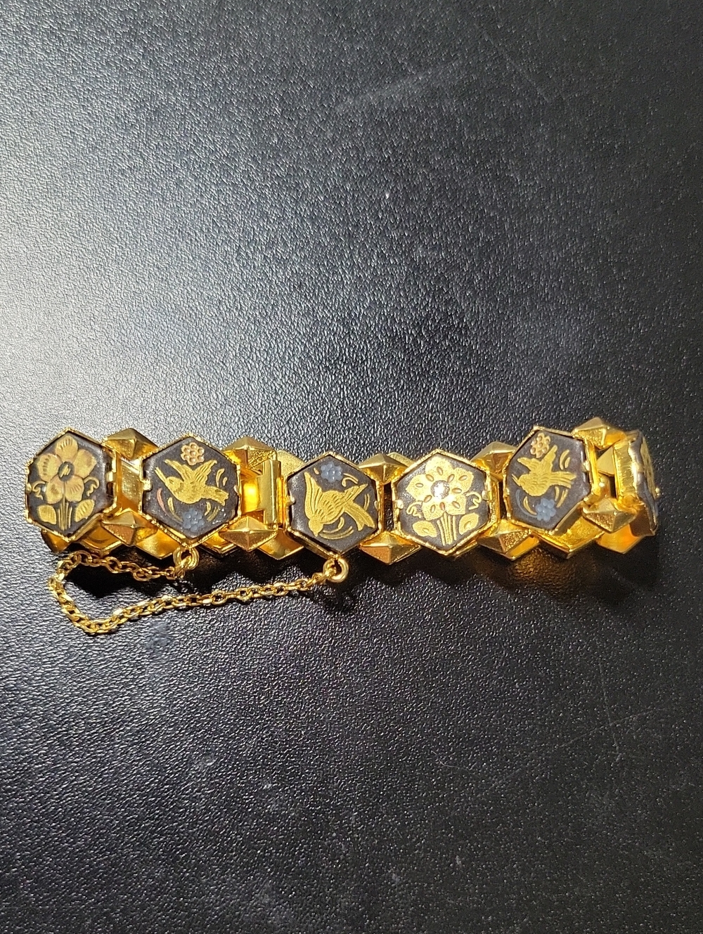Gold-Tone Floral Link Bracelet with Black Enamel Accents